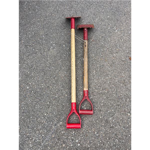 Two Red Handheld Multi-Tooth Ground Rake Tools with Wooden Handles