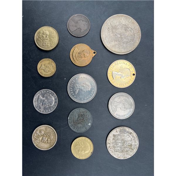 14 Assorted Coins Featuring Various Designs and Denominations