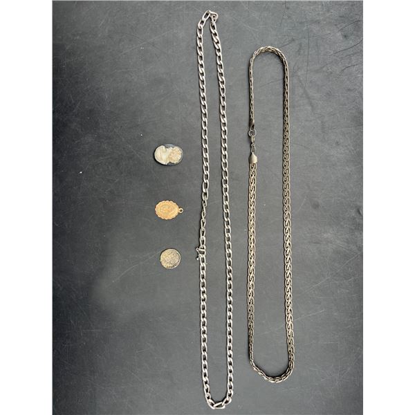 Two Chains and Three Pendant Charms Featuring Various Designs