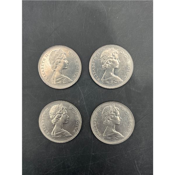Four 1969 and 1979 Canadian Silver Dollars