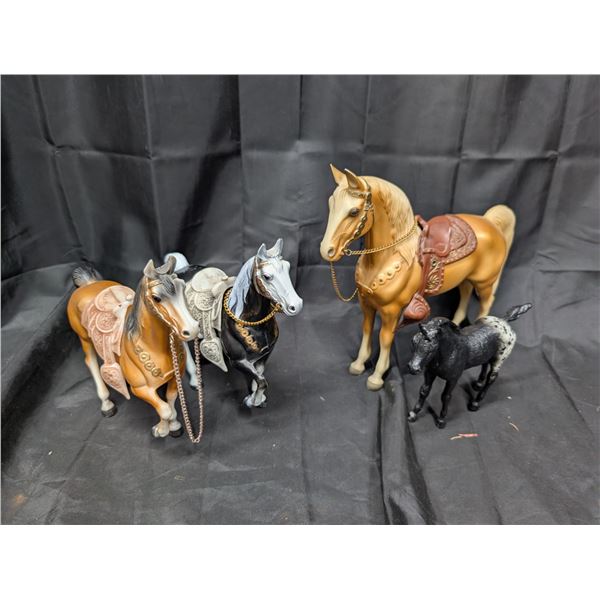 (4) Plastic Vintage Horses w/ Saddles and etc.