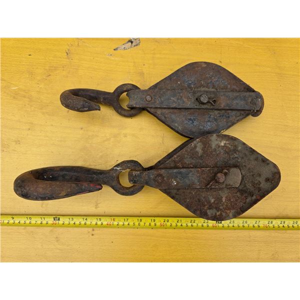2 antique pulleys
