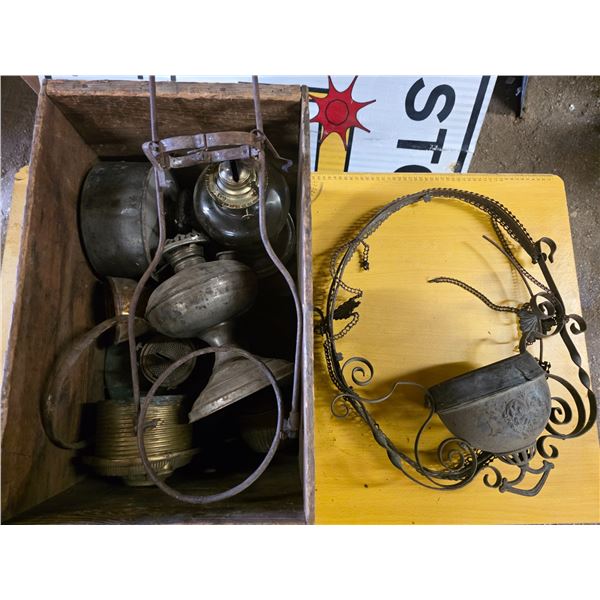 Box of various hanging lamp parts and lamp bases