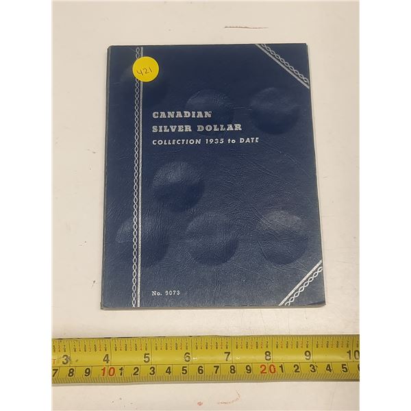 Empty Whitman folder for Canadian Silver Dollar. Used.