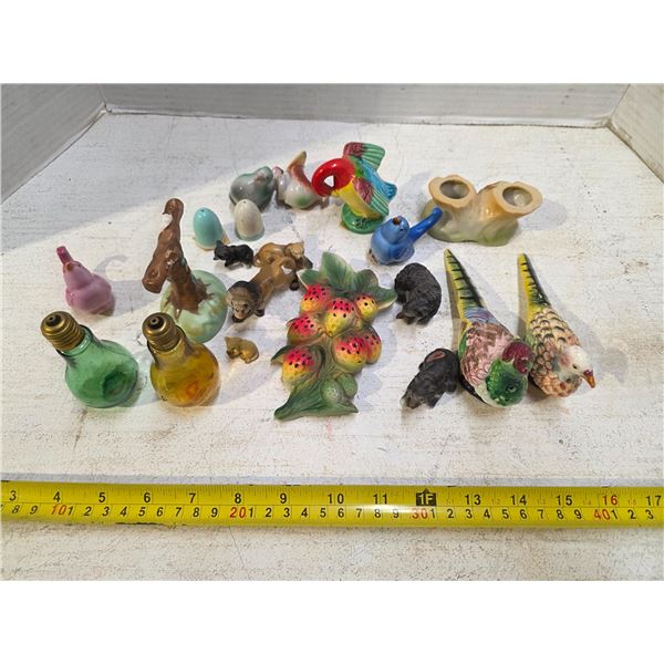 Salt and pepper shaker with misc figures