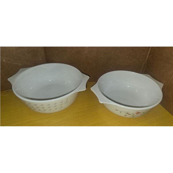 2 Patterned Pyrex covered bowls