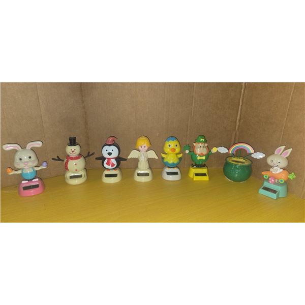 Collection of 8 toy bobbleheads