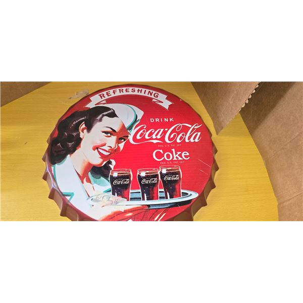 Coca Cole bottle cap sign