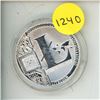 Image 1 : Physical commemorative coin representing litecoin (LTC), A prominent crypto currency
