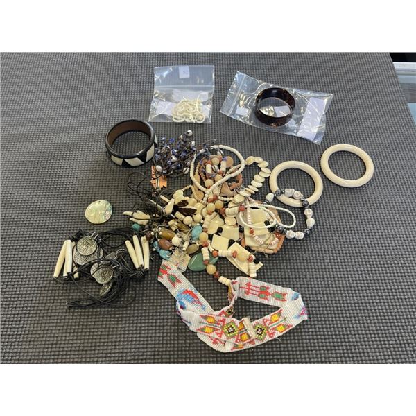 LARGE BAG OF MISC BONE JEWELRY INCLUDING HAND CARVED BRACLET AND HAND CRAFTED NECKLACE