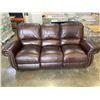 Image 1 : BROWN LEATHER DOUBLE RECLING SOFA WITH BRASS NAILHEAD ACCENT