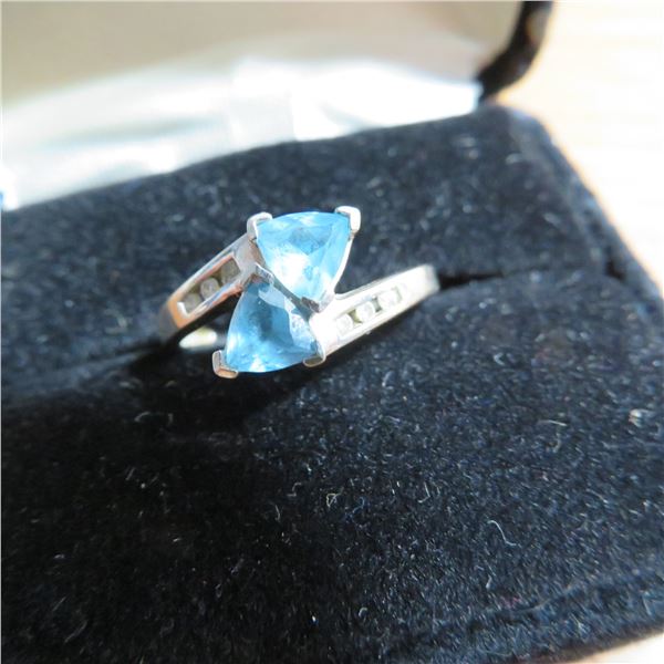 10K white gold and blue topaz ring.  Absolutely beautiful!  Approx size 6.5