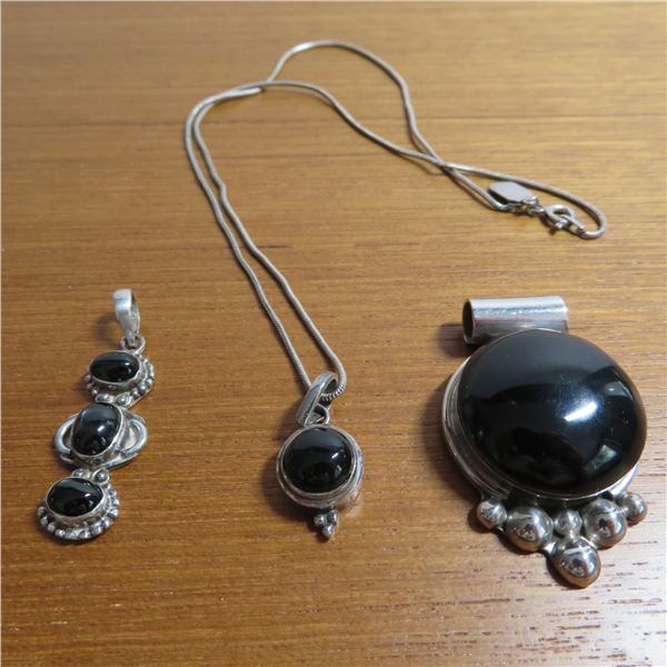 925 Sterling lot.  Chain with 3 gorgeous pendants with black stones.
