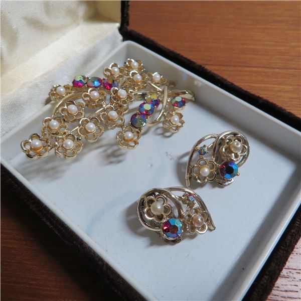 Vintage CORO Brooch and clip on earrings set.  Red iridescent stones and pearls?