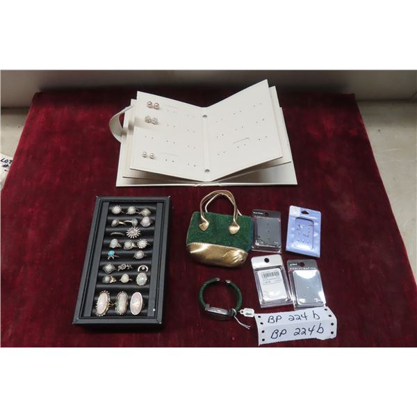 Costume Jewelery in Cases: 22 Rings, 9 pairs Earrings, Suisse Watch and 4 Pkgs Pierced Hoops