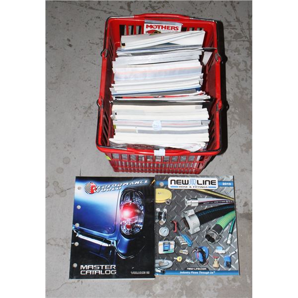 BASKET OF PARTS MANUALS AND AUTOMOTIVE BOOKS