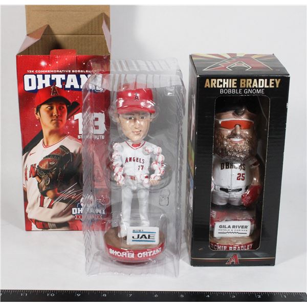 TWO BOBBLE HEADS. ARCHIE BRADLEY, AND