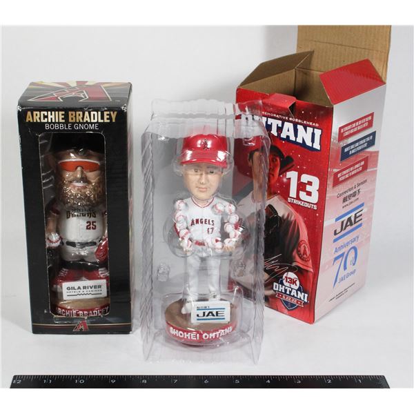 TWO BOBBLE HEADS. ARCHIE BRADLEY, AND