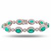 Image 1 : 11.44 ctw Emerald and 3.50 ctw Diamond 14K White Gold Bracelet
