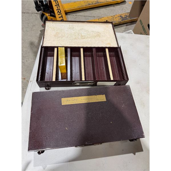 Metal slide boxes also hold coins