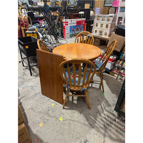 Table and four chairs, one leaf
