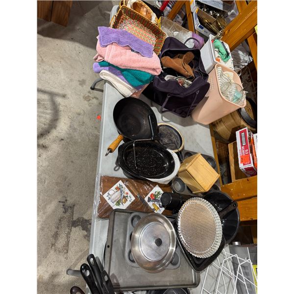 Miscellaneous slot towels, baking pans, kitchen, ware, etc.