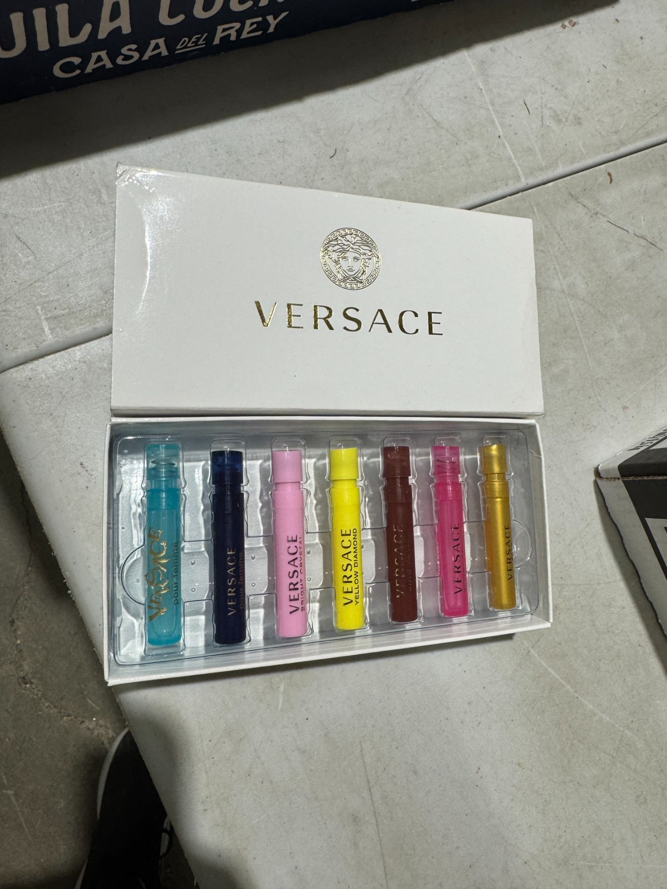 Versace samples about half full