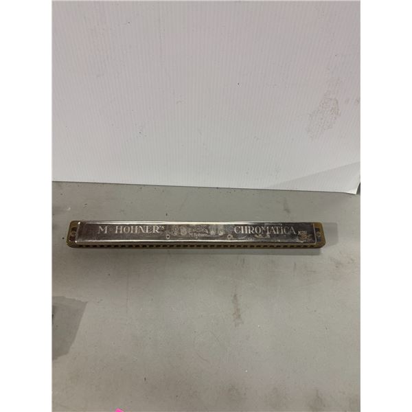 M HoHner's  chromatic number 261 harmonica