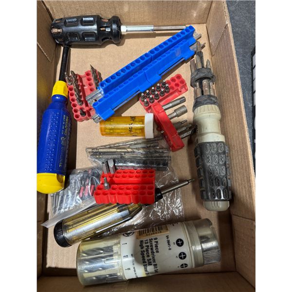 Assorted tools, bits, screwdriver, bits up, and drill bits
