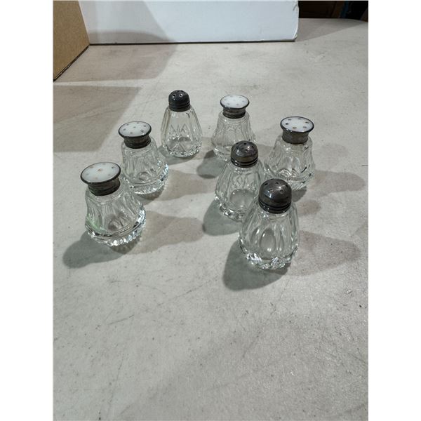 Salt and pepper shakers  tops sterling