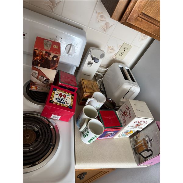 Cocktail glass shaker with metal top, toaster, coffee, and tea maker mugs can opener