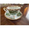Image 1 : 3 footed tea cup with saucer