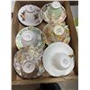 Image 1 : Assorted tea, cups, and saucers