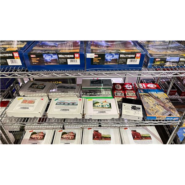 SHELF OF ASSORTED HO SCALE SCENIC STRUCTURES