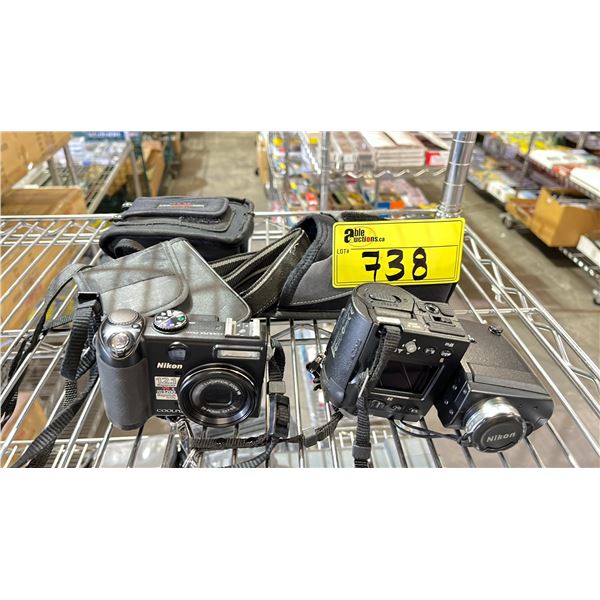 2 NIKON DIGITAL CAMERAS WITH CASES