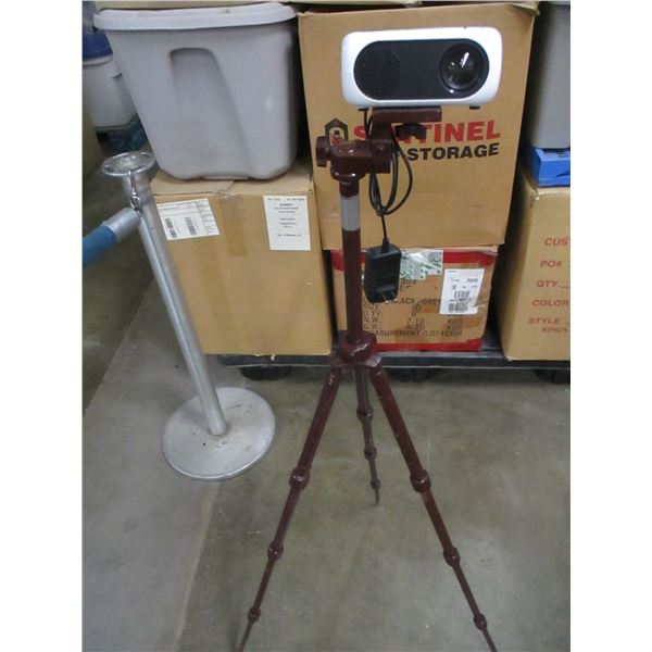 UNCLAIMED STORAGE:  BROWN TRIPOD