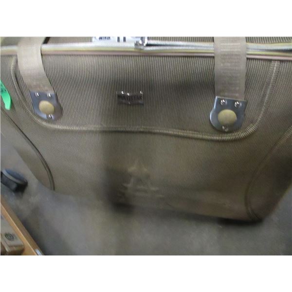 UNCLAIMED STORAGE:  LARGE SUITCASE ON WHEELS (HANDLE NEEDS REPAIR)
