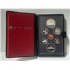 Image 1 : 1981 7-coin Proof Set. The beautifully toned Silver Dollar commemorates the 100th Anniversary of the