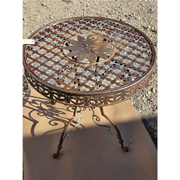 Wrought iron garden/ metal table- 31"W by 29"H