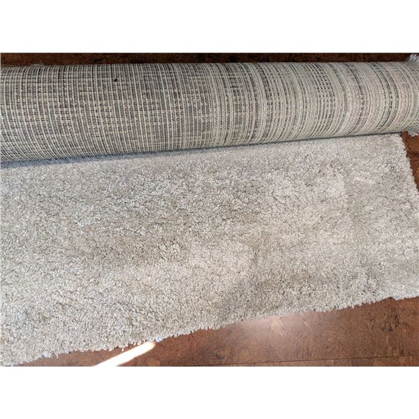 10 ft x 8 ft area rug.   " Beige " color
