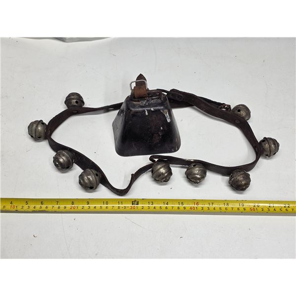 Strap of  9 sleigh bells and cow bell with original donger