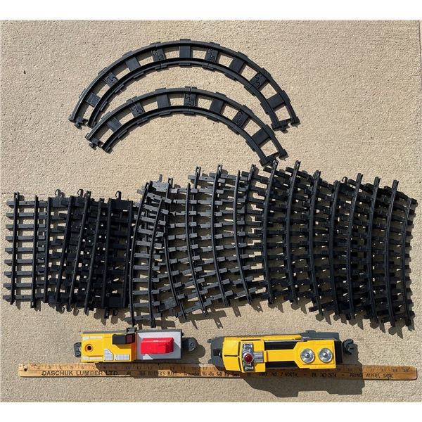 Box of train set tracks, Caterpillar Engine (C size batteries not included!) and car.