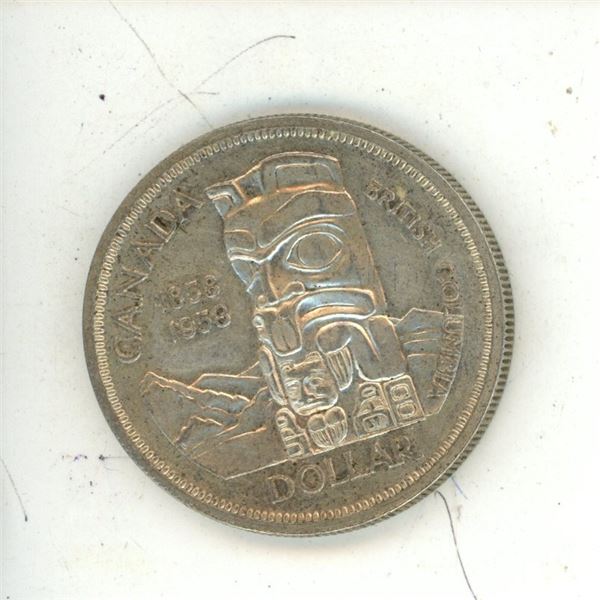1958 Canadian Silver One Dollar Coin.