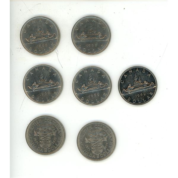 (2) 1968, (3) 1969, (2) 1971 Canadian One Dollar Coins.