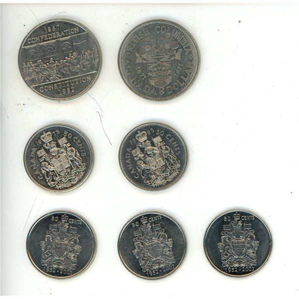 1971, 1982 Canadian One Dollar and 1978, 1985, (3) 2002 Canadian 50 Cents Coins.