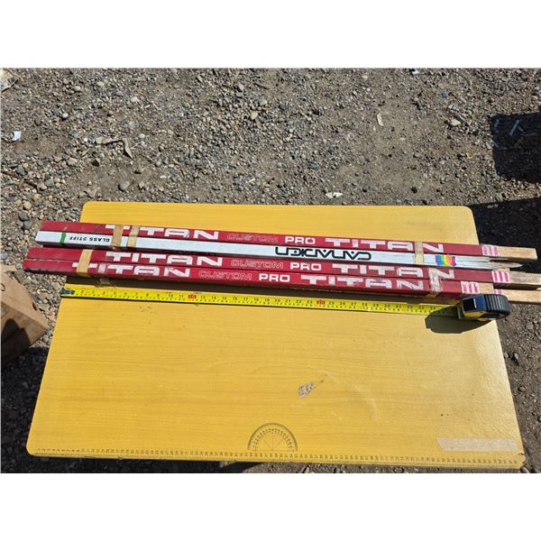 Lot of hockey sticks