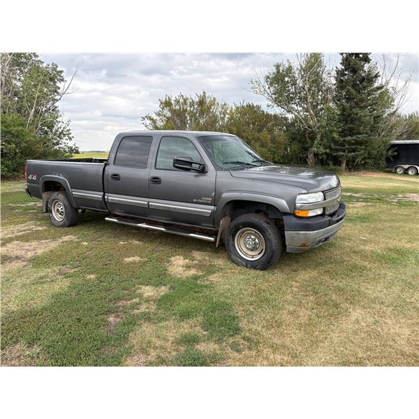 2002 silver CHEV 2500 4x4 Quad Cab Diesel, showing 373,448 Km., New Batteries, 5th Wheel hitch, SN. 