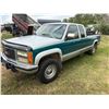 Image 3 : GMC 2500 Ext. Cab, 4x4 Diesel, Auto, showing 423,609 Km., New Batteries, Silver & green, SN. 1GTGK29