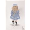 Image 2 : Antique German all-bisque doll with blue sleep eyes, mohair wig and hand knit costume, 5" in height 