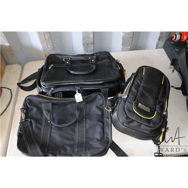 Two lap top bags including a Kenneth Cole leather bag and a Storm Tech webbed bag. Plus a small back